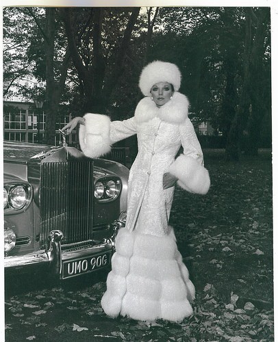 Joan Collins poses in white fox from head to toe -she is truly regal Joan Collins poses in white fox from head to toe -she is truly regal