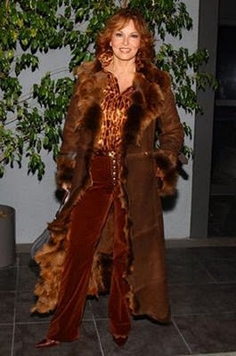 Raquel Welch in a floor length fur lined coat Raquel Welch in a floor length fur lined coat