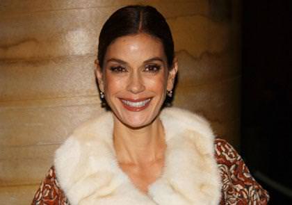 A fresh faced Teri Hatcher dressed in a fur collar coat