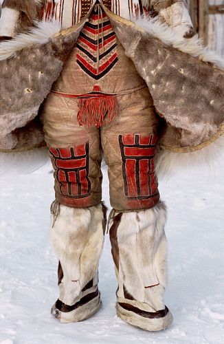 A traditional Nganasan woman's combination reindeer skin under garment worn together with knee length boots. Taymyr, Northern Siberia, Russia.