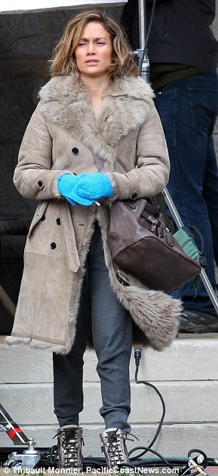 Jennifer Lopez was spotted on the set of her upcoming movie "Lila & Eve" earlier this year in a grey-tone shearling.