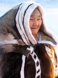 Inuit elder Qappik Attagutsiak in her traditional caribou and sealskin clothes. Arctic Bay, Baffin Island, Nunavut, Canadian high Arctic. Photo by Sue Flood.