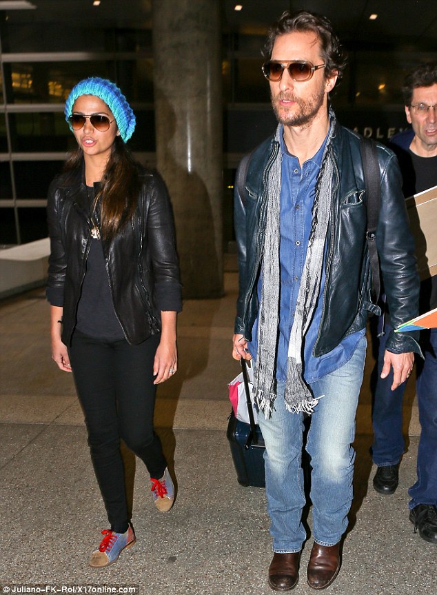 Matthew McConaughey and his wife Camila Alves touched down in LAX after a trip to Shanghai.