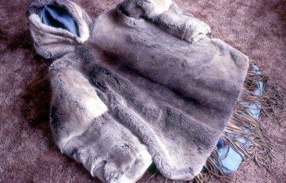 The traditional parka is a heavy outer jacket with the fur facing outwards worn with a second jacket of the same fur (the ATIGI), worn beneath it with the fur facing inwards. (JohnTyman)