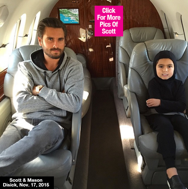 Scott Disick hangs out with son Mason Disickas they wait to take off for an adventure on a Private jet