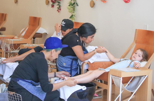 Like mother like daughter. Victoria Beckham takes her daughter Harper Beckham to get her nails done at a Beverly Hills shop in early April