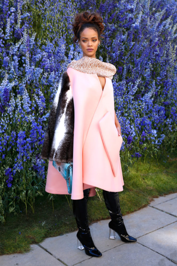 Rihanna rocking a fur sleeve cape from Dior's Spring 2016 collection