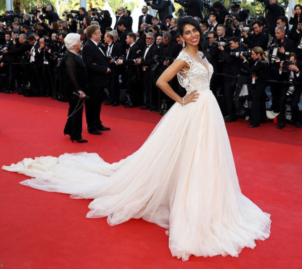 Actress Fagun Thakrar took to the red carpet with style, wearing an incredible long pink dress with a laced front and a stunning train from designer Galia Lahav