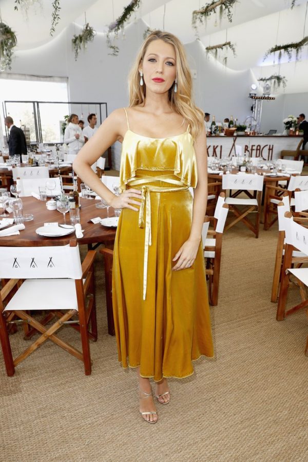 Blake Lively continued her streak of flawless Cannes outfits in a canary yellow day dress at the Cafe Society press luncheon.