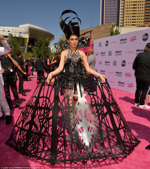 We are mentioning this only because it's like the 10,000lb elephant in the room. Electro-pop singer Z LaLa ASSumed she was making a statement in this dress. Well, you know what they say about assuming.