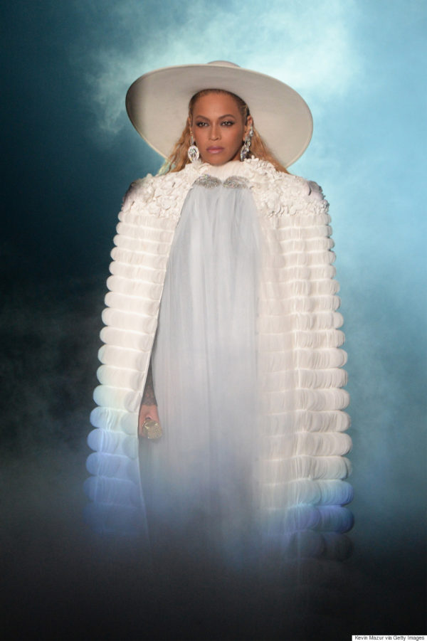 Opening her epic 16 minute performance Beyonce wore a Ralph & Russo white silk organza cape