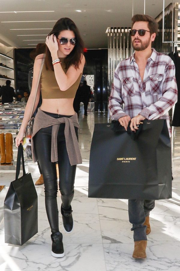 Kendall Jenner and Scott Disick holding Saint Laurent bags shopping for the holidays on Rodeo Drive