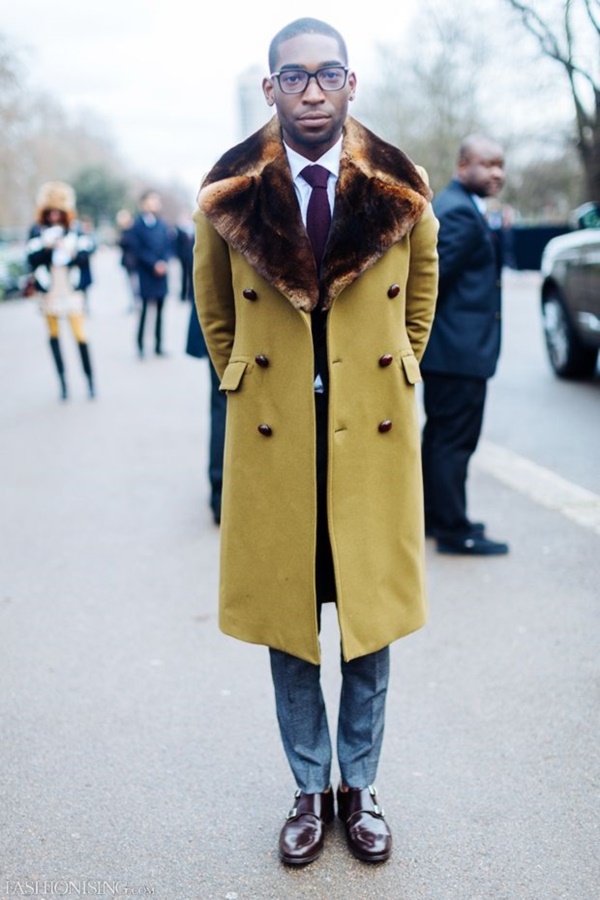 A strong fur collar on an overcoat screams sophistication