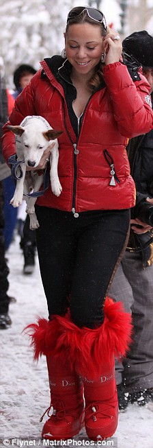 Mariah Carey in winter boots in snow