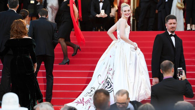 Elle Fanning looked like a throwback to Grrace Kelly in her ornate Vivienne Westwood gown at Cannes Film Festival 2017