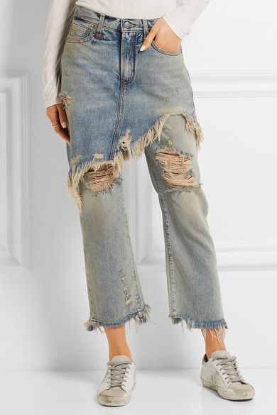 Overly distressed luxury fashion denim