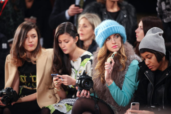 front row luxury fashion influencers during New York Fashion Week