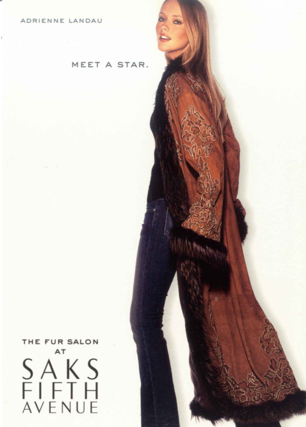 Boho inspired wraps with fur trim is a hallmark of the Adrienne landau brand