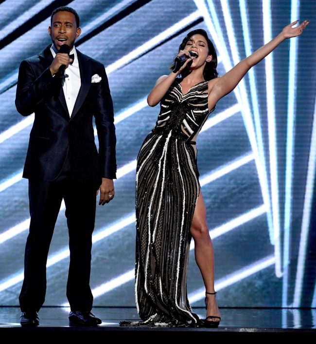 Vanessa Hudgens onstage introducing her idol Celine Dion during the 2017 Billboard Music Awards