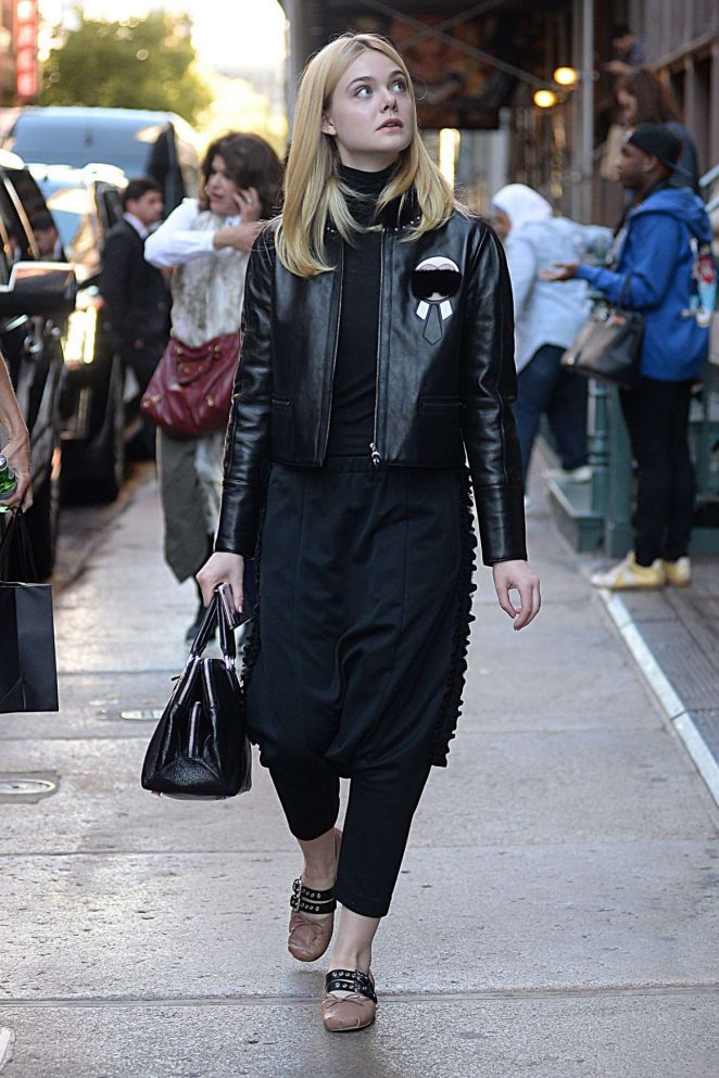 Elle Fanning hits the streets of NYC in a Fendi Karlito black leather jacket and matching with hard-to-pull-off harem pants in age appropriate style