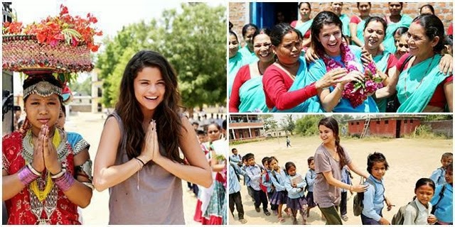 Selena Gomez is greeted by students at Satbariya Rapt Secondary School wearing traditional Nepali clothing while on a mission for UNICEF