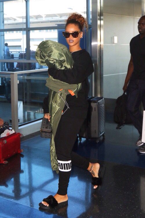 furry footwear Rihanna sporting her Fenty for Puma fur pool slides