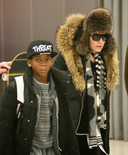 Madonna with her son David making their way through the airport in 2015 