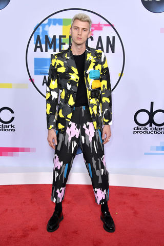 Machine Gun Kelly lit it up in his funky and colorful print ensemble