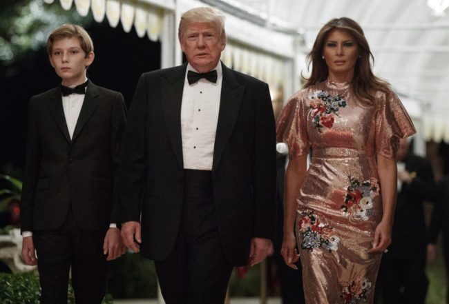 celebrity style President Donald Trump arrives for a New Year's Eve gala at his Mar-a-Lago resort with first lady Melania Trump and their son Barron