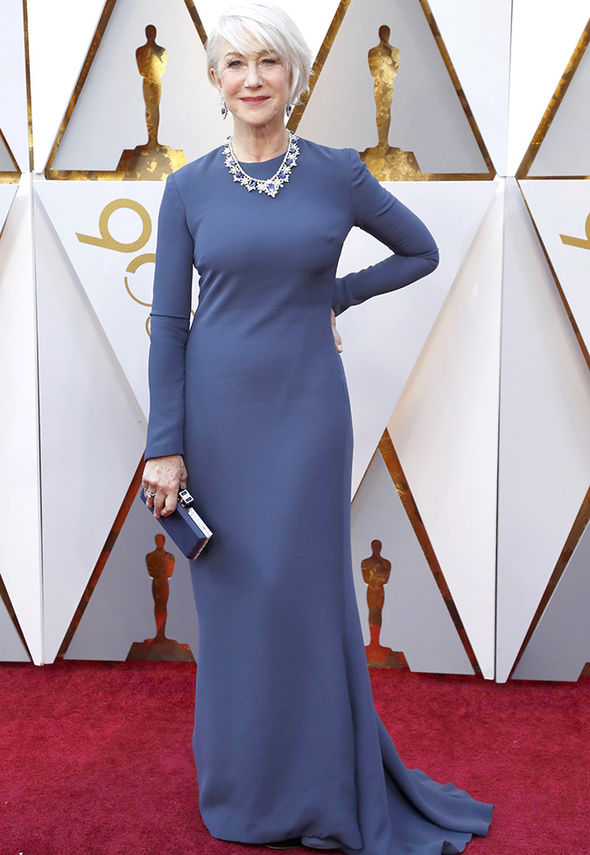 When you look this good you don't need much folks! Helen Mirren, at 72...not a typo, showed off her her hourglass curves in a simple floor-length sheath dress at the 2018 Oscars