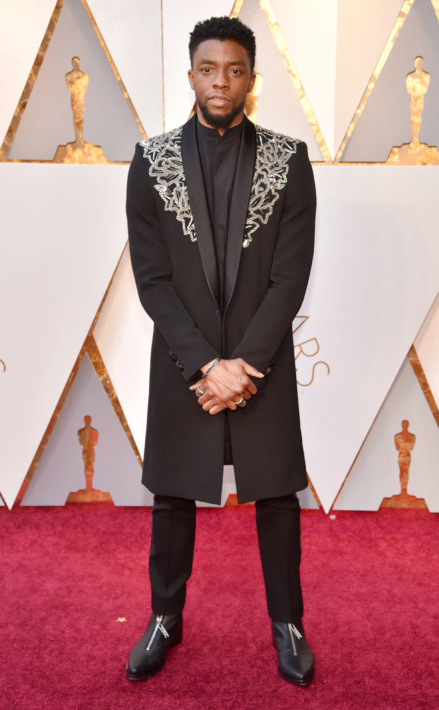 Chadwick Boseman's elongated tux jacket with elaborate metallic embellished collar solidified his place as KING of the carpet for us at the 2018 Oscars