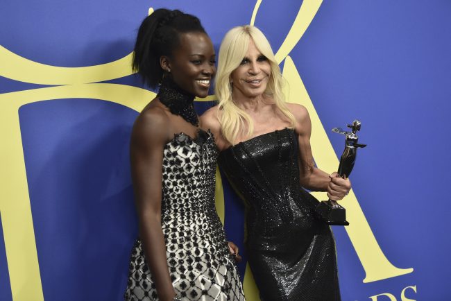 Actress Lupita Nyong'o (left), and fashion designer Donatella Versace, winner of the international award, at the 2018 CFDA Awards