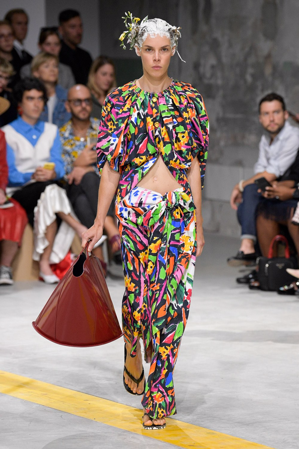 MILAN - JUNE 16: Woman with white and blue Louis Vuitton sneakers walking  before Marni fashion show, Milan Fashion Week street style on June 16, 2018  Stock Photo - Alamy